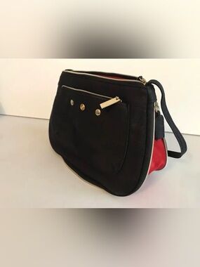 Yves Saint Laurent parfums Black mini shoulder
Bag YSL Gold zipper red interior